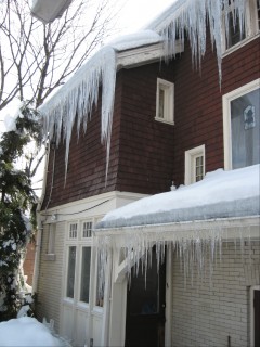icicles hanging from roof, maybe 6-7 feet long